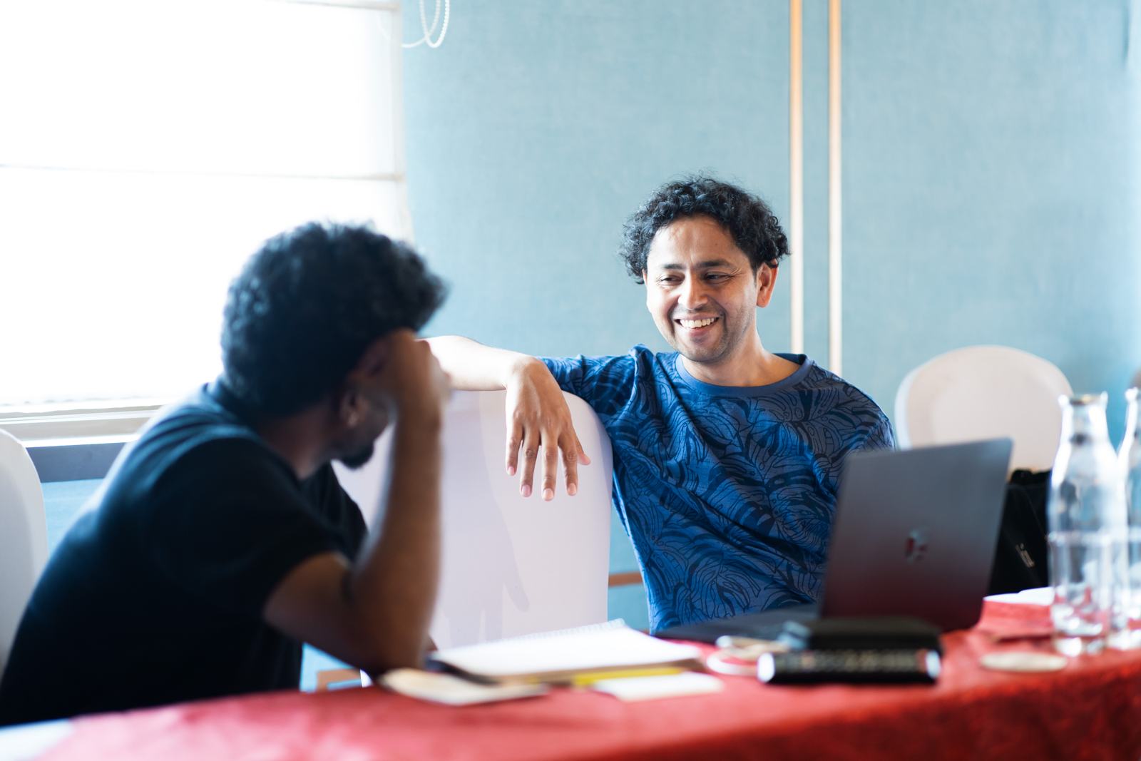 Mentor and filmmaker in a one-on-one session